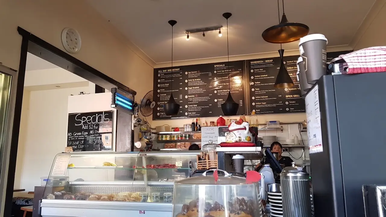 The counter and cake cabinet at Meeks Cafe