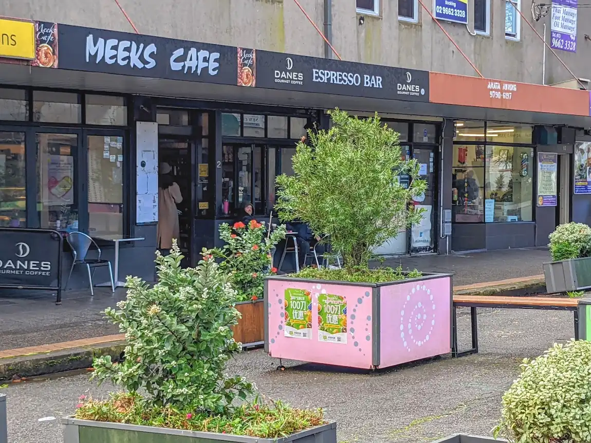 The Meeks Cafe shopfront and outdoor tables on Meeks St, Kingsford